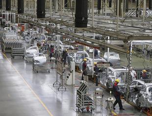 China factory output grows more than expected last month