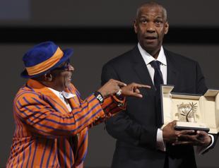 Irans Panahi pokes fun at Irans jailers in Cannes comeback