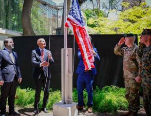 US envoy for Syria raises flag outside Damascus residence as Washington mends ties