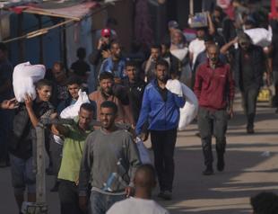 Israeli fire kills dozens near aid site in Gaza