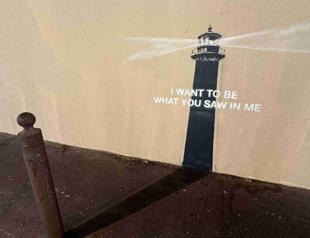 Shadow becomes art in Banksy’s mural