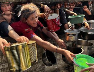 Israel fire near aid center kills at least 57 in Gaza