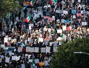Protests spread across US despite Trump threats