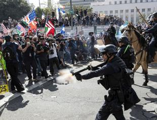 Waves of protesters flood US streets against king Trump