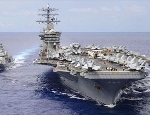 US warship reported heading toward Mideast as Iran, Israel fight