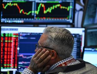 Oil edges down, stocks mixed but Mideast war fears elevated