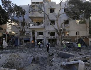 23 hurt, building hit in Israel after Iran missiles