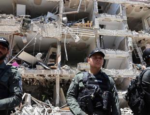 Israelis emerge from shelters to devastation after Iran attacks