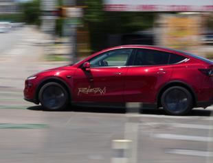 Tesla launches long-discussed robotaxi service
