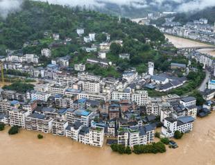 Over 80,000 people flee severe flooding in China