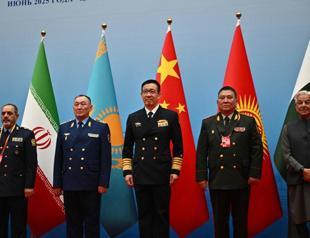China hosts Iranian, Russian defense ministers against backdrop of momentous change