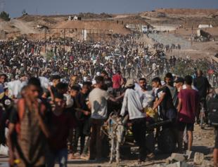 Spain PM alleges genocide in Gaza as rescuers say 65 killed