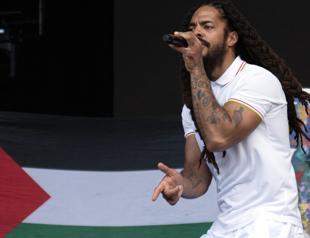 Police review footage of chants led by Glastonbury acts