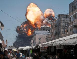 Gaza rescuers say Israeli forces kill over 50 as ceasefire calls mount