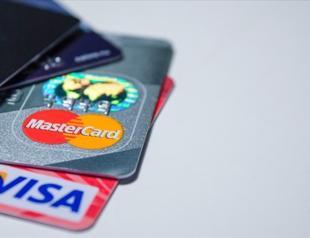 Watchdog launches probe into Visa, Mastercard