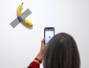 France museum-goer eats million-dollar banana taped to wall