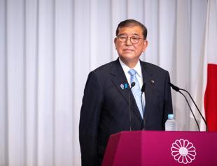 Japanese PM hangs on after extremely regrettable election