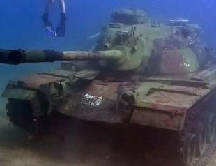 Battle tank draws divers to Saros Gulf