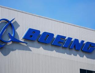 Boeing workers threaten strikes at fighter jet factories