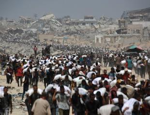 Gaza aid a ‘drop in ocean’ as Israel pauses some fighting