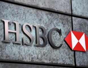 HSBC says pre-tax net income drops to $15.8 bln in first half