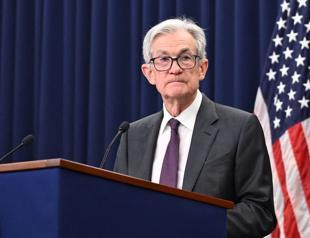 Trump renews attacks on Fed chair after rates held steady