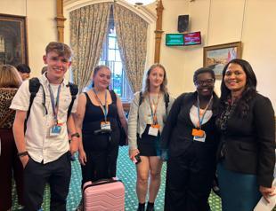 UK minister for homeless quits after charging higher rent