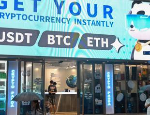 Bitcoin hits record high above $124,000