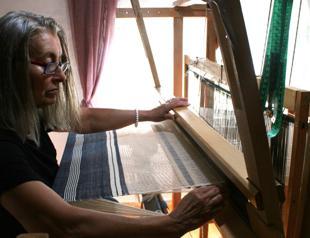 Artisan transforms old clothes into handcrafted treasures