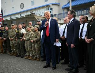 Trump visits police, troops deployed in US capital