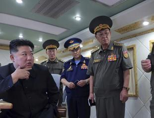 North Korea test-fires two new air defense missiles