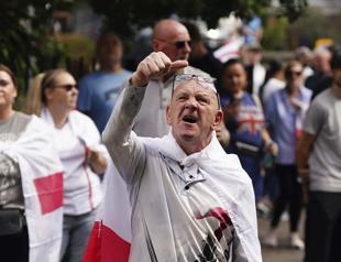 UK vows to speed up asylum claims as hotel protests spread