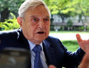 Trump urges criminal charges against George Soros, son