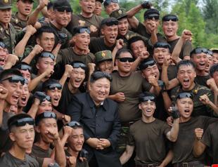 Kim to attend military parade in China