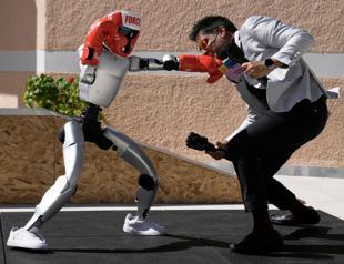 Humanoid robots are on a long road to catch up to advanced AI