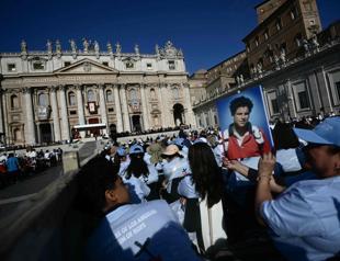 Huge crowds at the Vatican as teen becomes first millennial saint