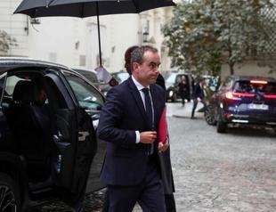 New French PM vows profound break with past