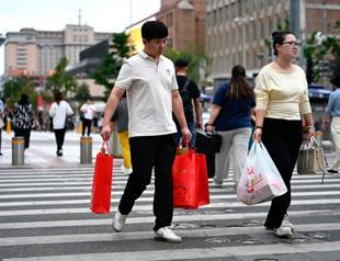 Chinese factory, consumer activity slow amid economy struggles