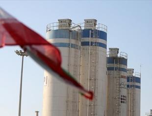 Iran says cooperation with IAEA suspended