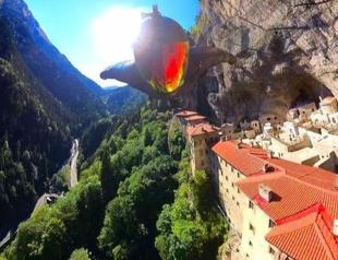 Wingsuit pilot from Ireland glides past Sümela Monastery
