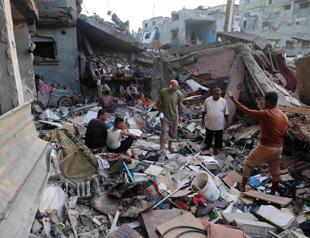 Hamas urges Israel to halt strikes as it searchs for two hostages