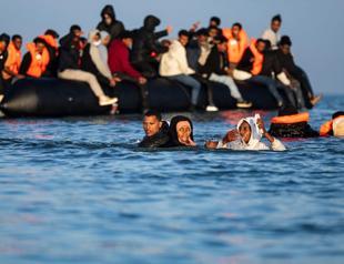 French officials: Almost 400 UK-bound migrants rescued
