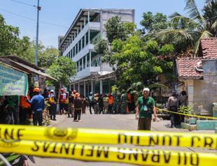 Rescuers say no more signs of life in rubble of collapsed Indonesian school