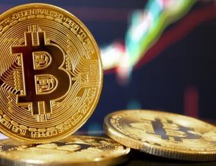 Bitcoin reaches new record high, rising above $125,000