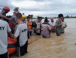 Rescuers scramble to deliver aid after deadly Nepal, India floods
