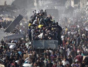 Aid trucks cross into Gaza