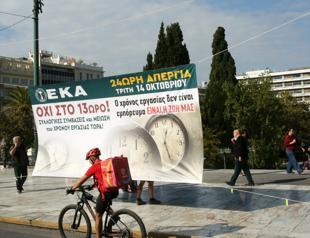 Greece lawmakers back plan to allow 13-hour workday