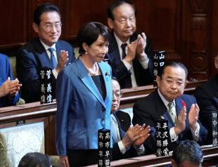 Japan parliament names first woman PM