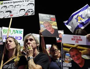 Israel says received remains of 3 Gaza hostages as fragile ceasefire holds