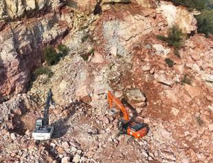 Search for man trapped under quarry landslide suspended due to safety risks